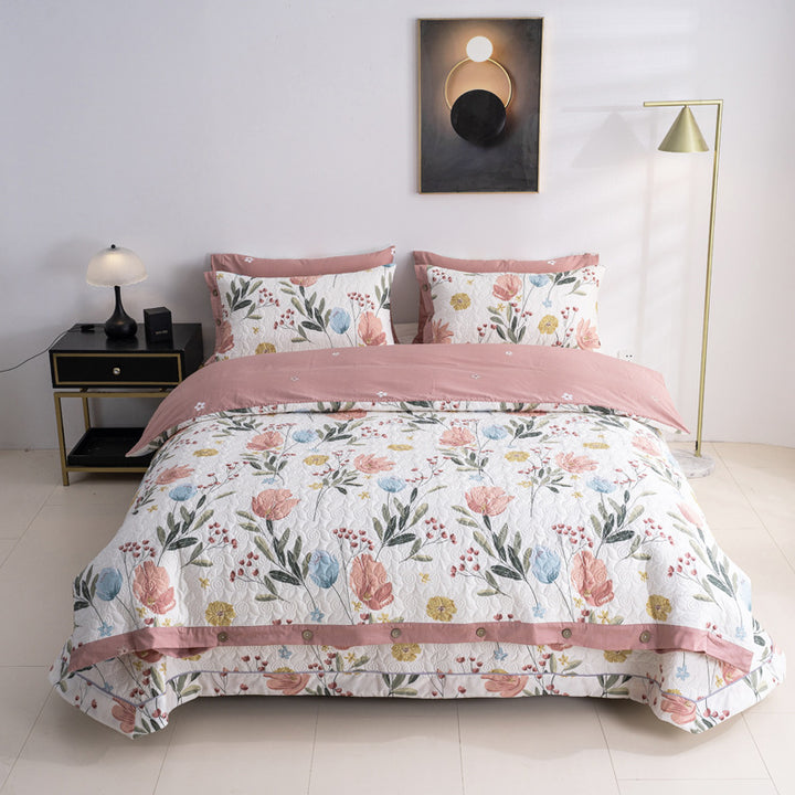 Quilted bedspread and bedding set with floral print, reversible function and decorative button placket