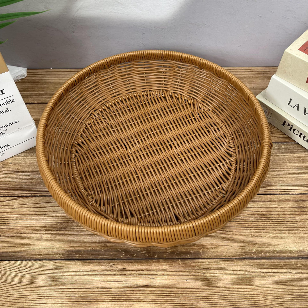 Women’s round serving basket made of woven rattan Stornfield