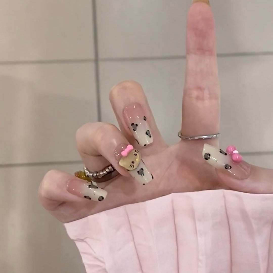Playful art false nails with cute animal motifs Stornfield
