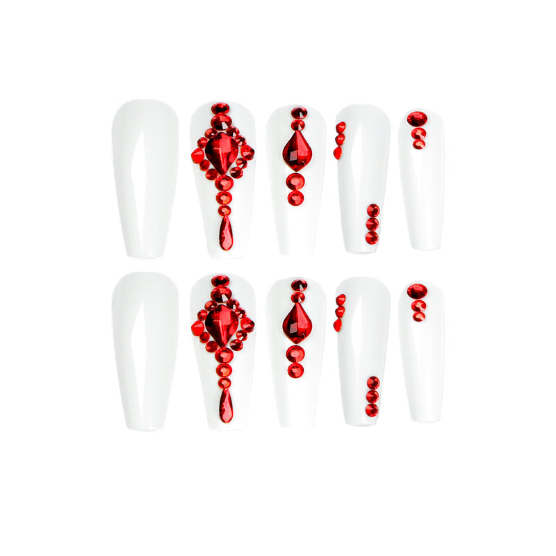 Artful nail extensions with glitter accents and elegant embellishments Stornfield