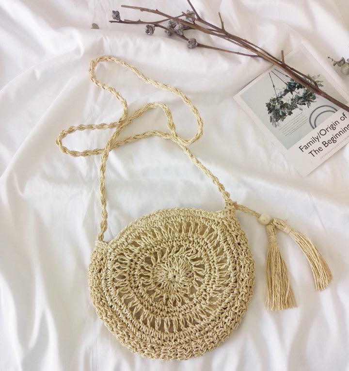 Hand-knotted round shoulder bag made of natural materials Stornfield