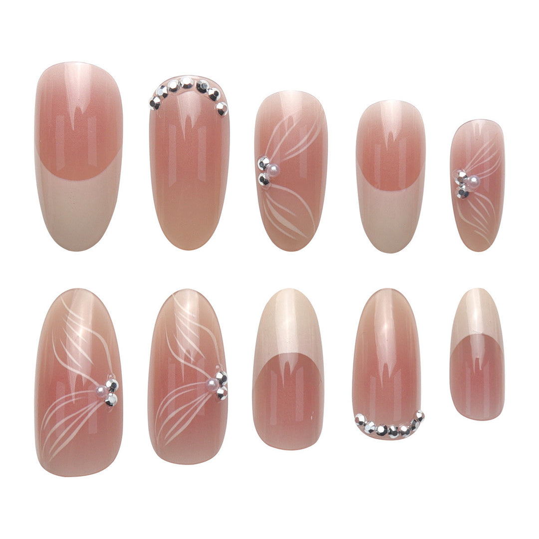 Elegant Long Stiletto Press-On Nails with Floral and Gem Accents Stornfield