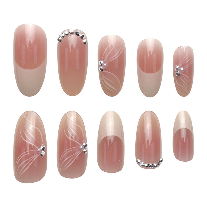 Elegant Long Stiletto Press-On Nails with Floral and Gem Accents Stornfield