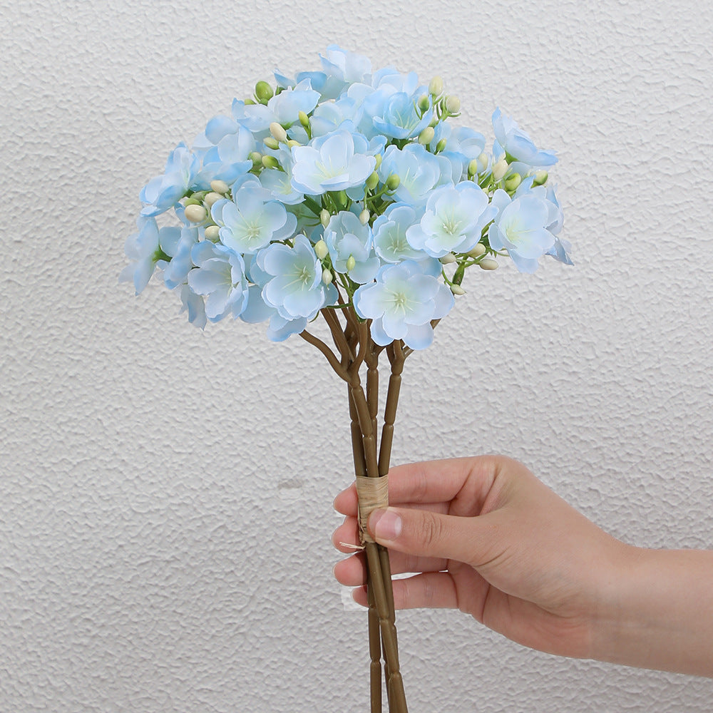 Artificial flower bouquet with delicate blooms