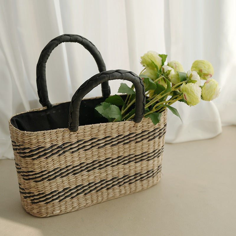 Women's handcrafted tote bag made from sustainable seagrass with stylish handles Stornfield