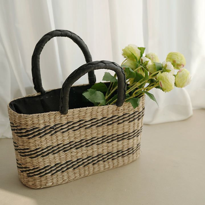 Women's handcrafted tote bag made from sustainable seagrass with stylish handles Stornfield