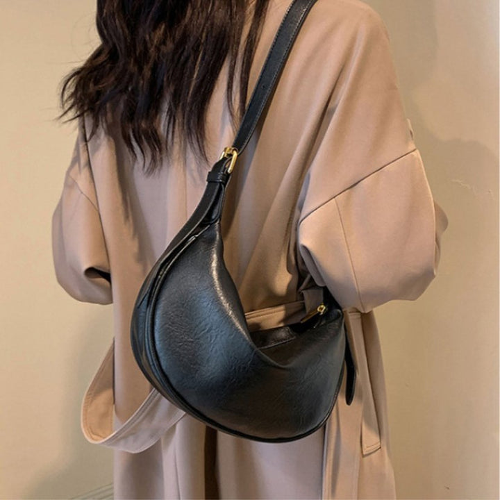 Sleek Crescent Shaped Crossbody Bag Stornfield