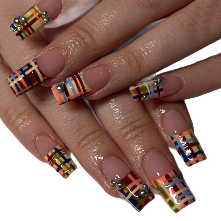 Artificial nails with geometric patterns and glossy accents Stornfield