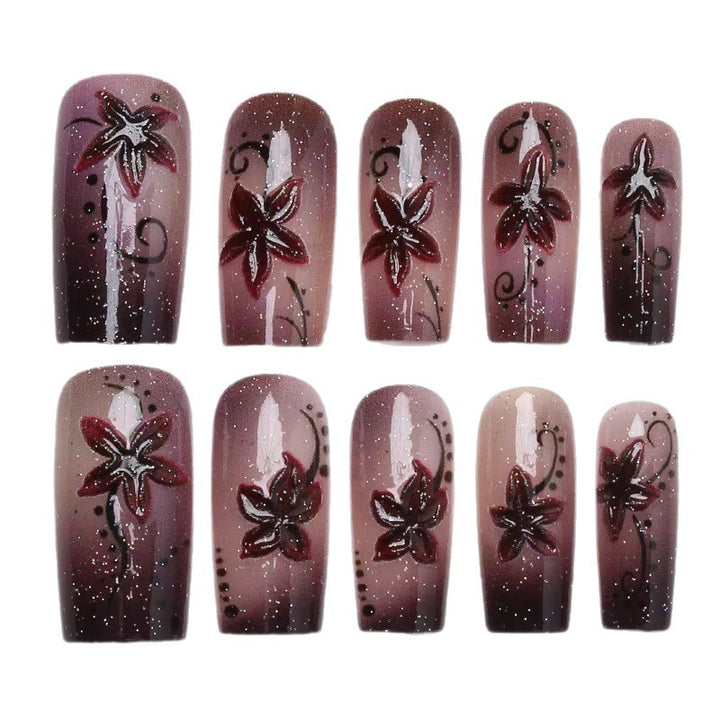Artificial nails with floral accents Stornfield