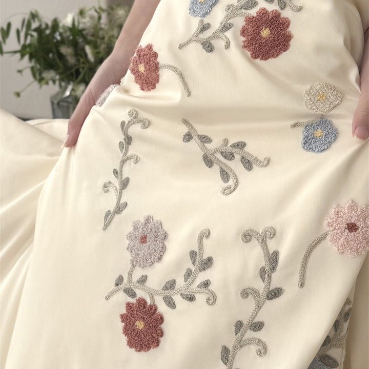 Luxurious satin bedding set with floral embroidery and pillowcases Stornfield