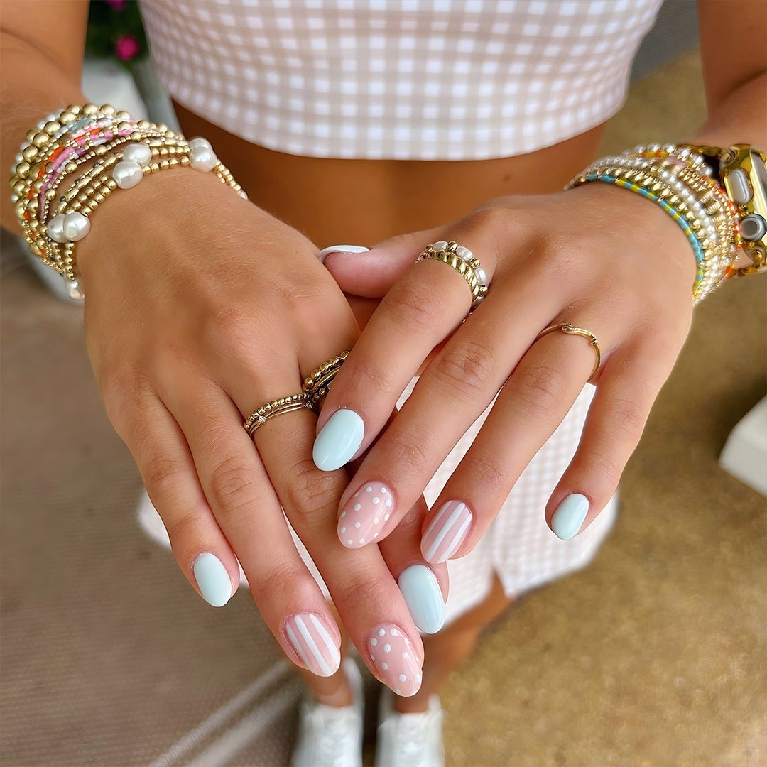 Creative Nail Art with Dots and Stripes Stornfield
