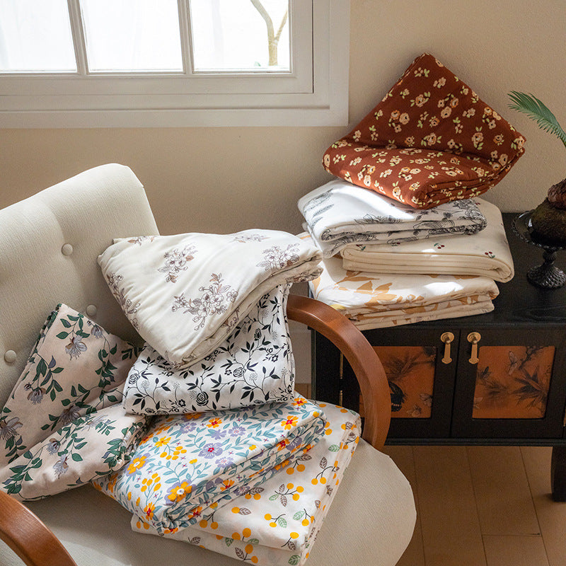 Organic Cotton Muslin Swaddle Blanket with Playful Cartoon Print