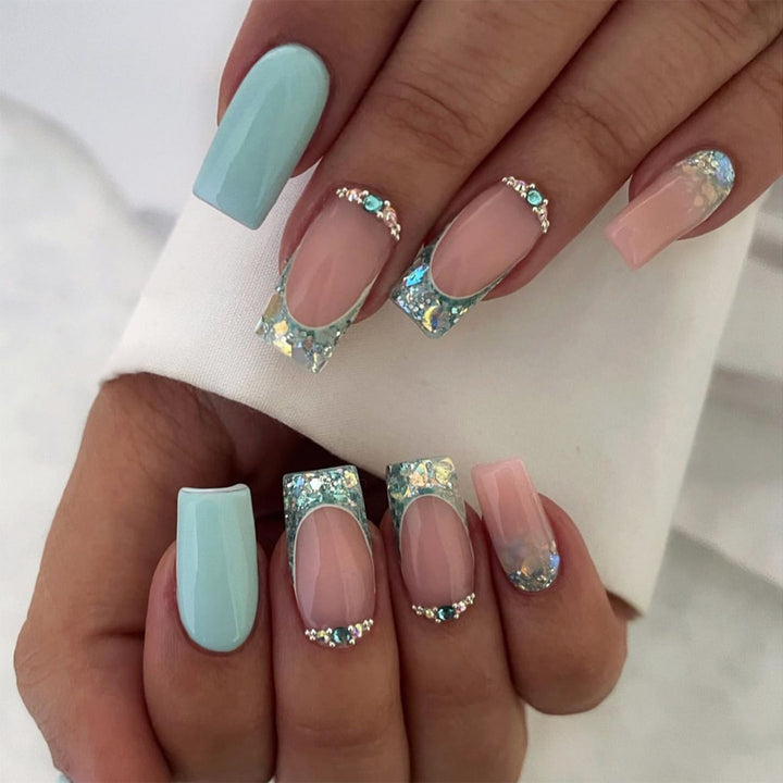 Sparkling nail art with creative rhinestone decorations Stornfield