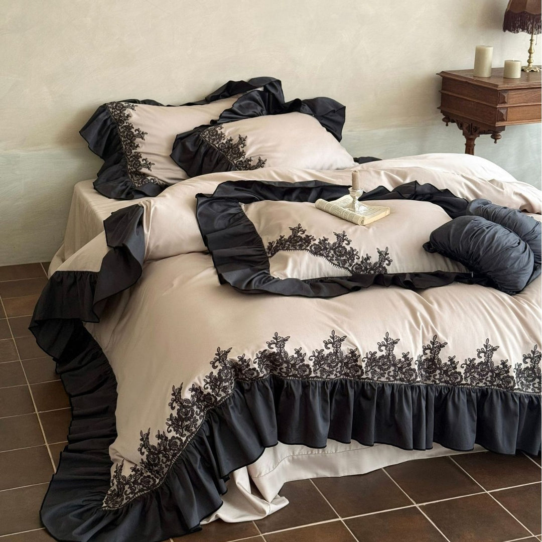 Satin bedding set with contrasting ruffle and ornament embroidery