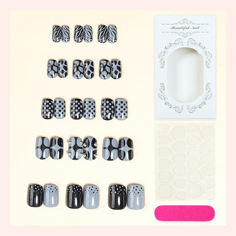 Fashionable geometric and dot pattern artificial nail set Stornfield