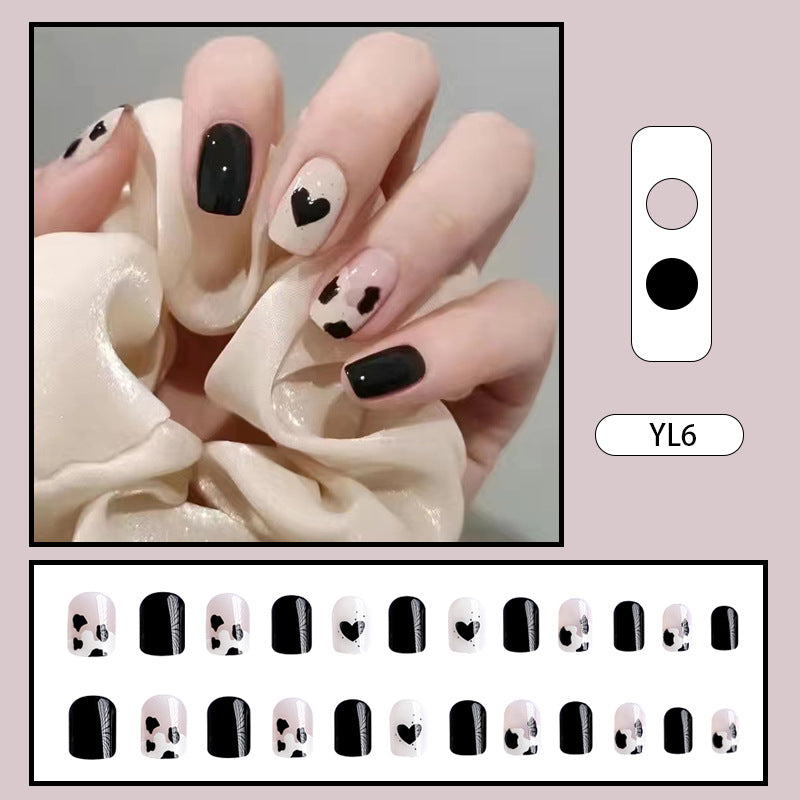 Creative nail art with heart and animal motifs Stornfield