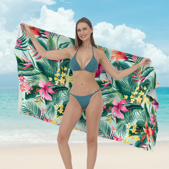 Beach towel with vibrant tropical plant motif Stornfield