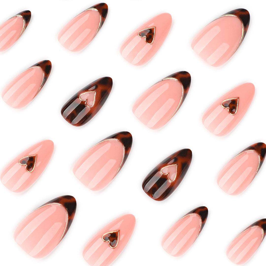 Artful stiletto nails with elegant heart design Stornfield