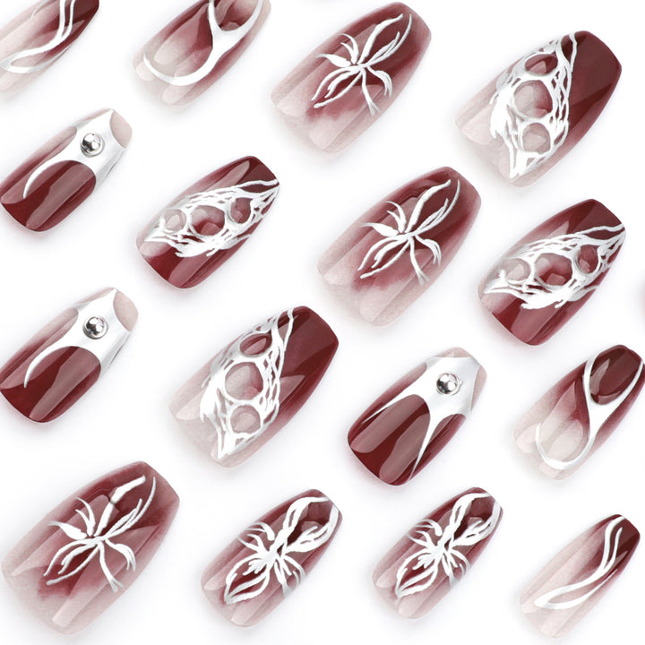 Artful Nail Extensions with Filigree Design Stornfield