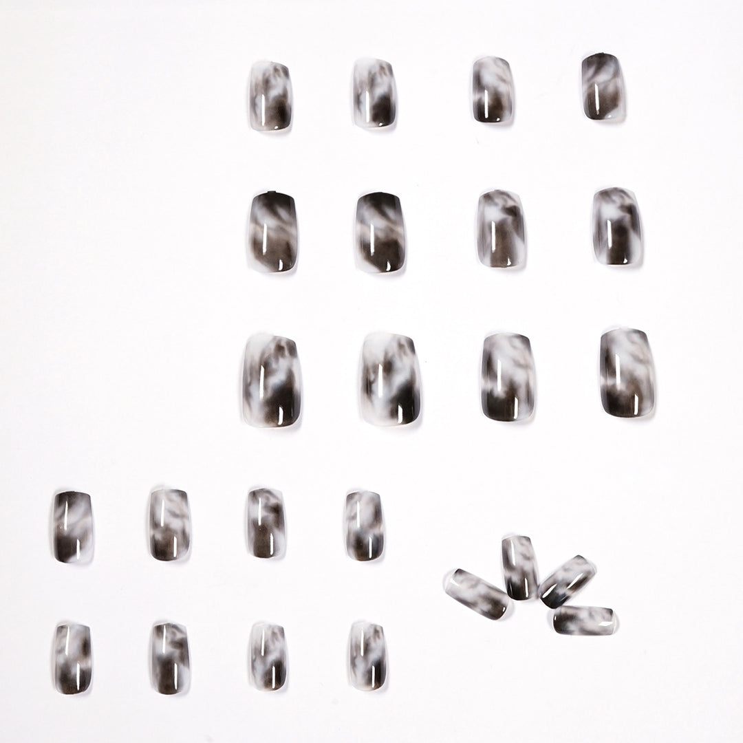 Artful Nail Extensions with Elegant Marble Design Stornfield