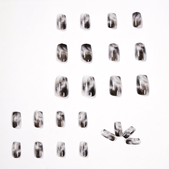 Artful Nail Extensions with Elegant Marble Design Stornfield
