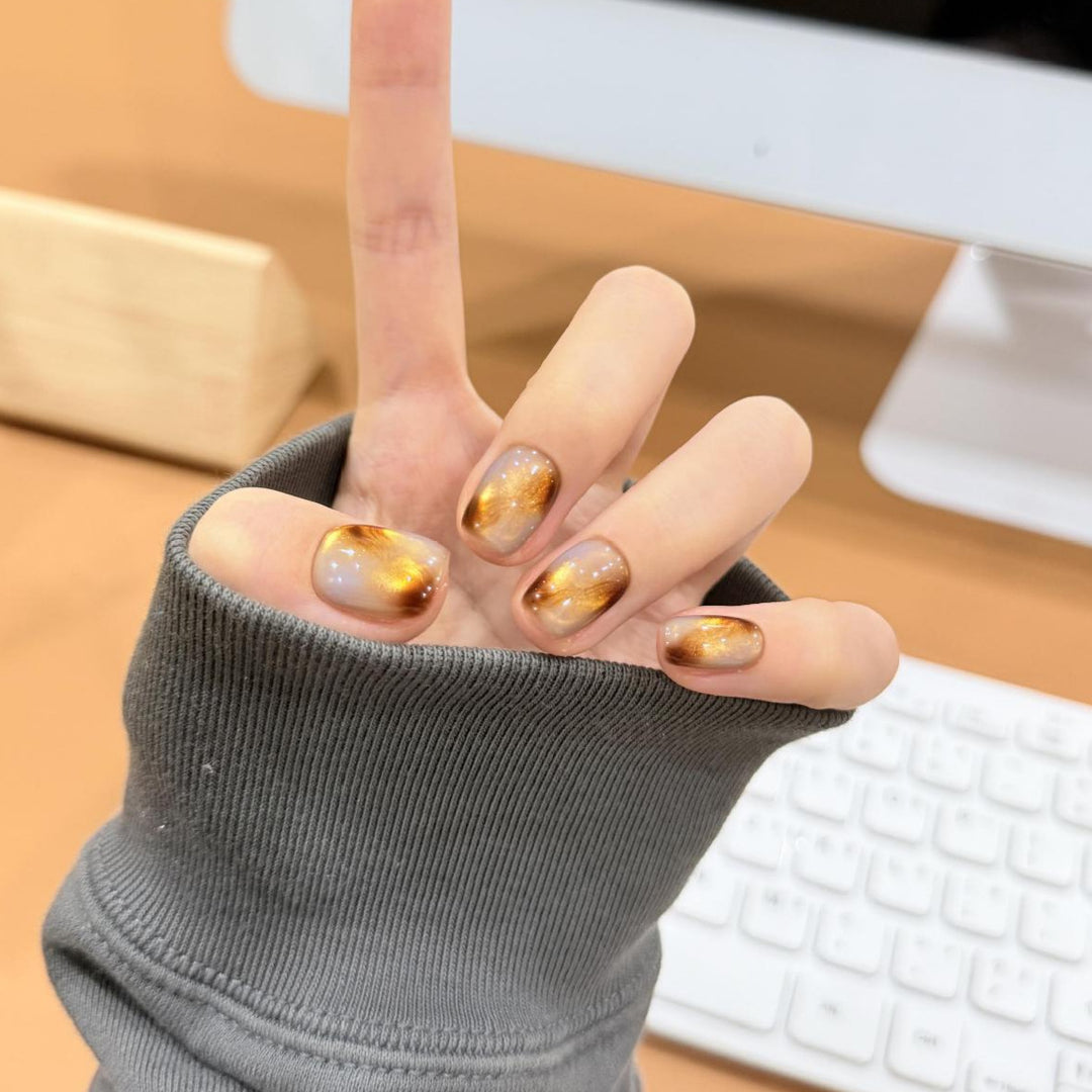 Artificial nails with noble metallic design Stornfield