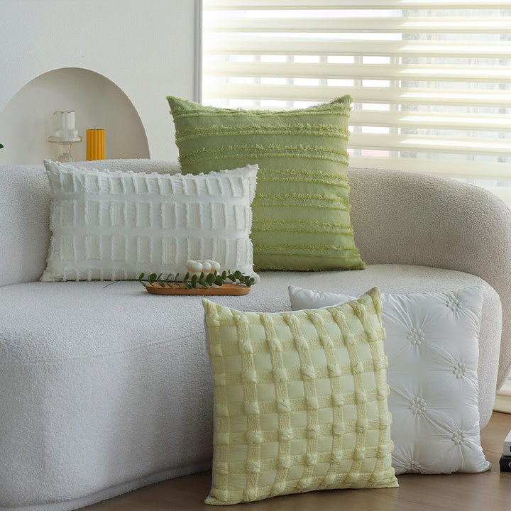 Square decorative pillow cover made of cotton blend with relief rectangular tufts and fringed edge Stornfield
