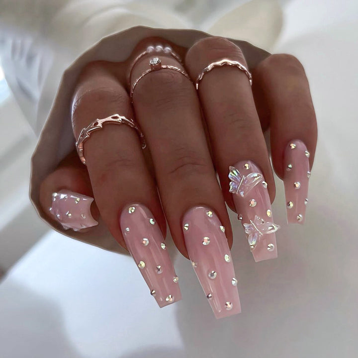 Artificial nail tips with glamorous rhinestone and butterfly designs Stornfield