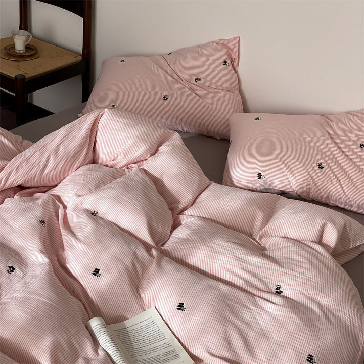 Bedding set made of breathable cotton percale with fine pinstripes and embroidered panda motifs