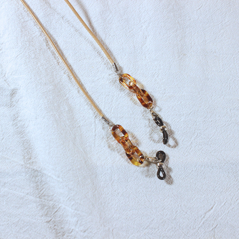 Fashionable glasses strap with pendants Stornfield