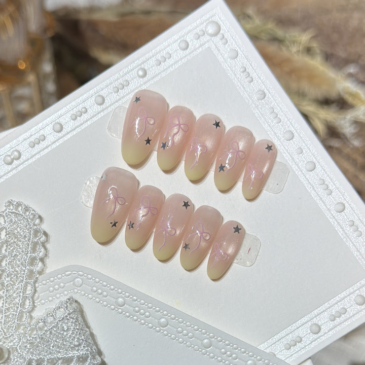 Press-On Nail Set with Bow and Star Accents Stornfield