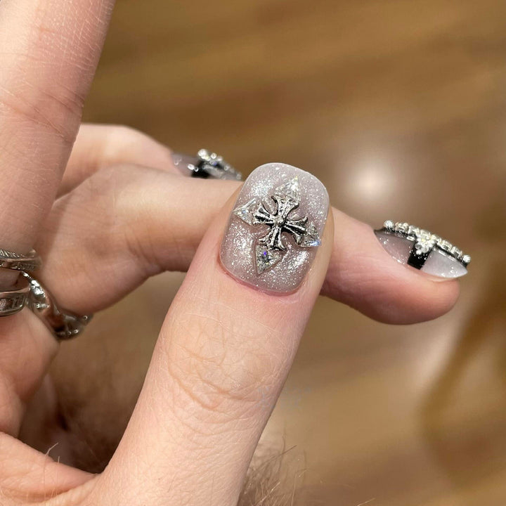 Glamorous artificial nails with rhinestone and glitter motifs Stornfield