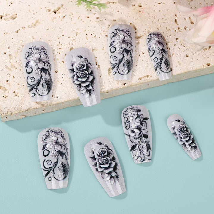 Artificial nails with floral designs Stornfield