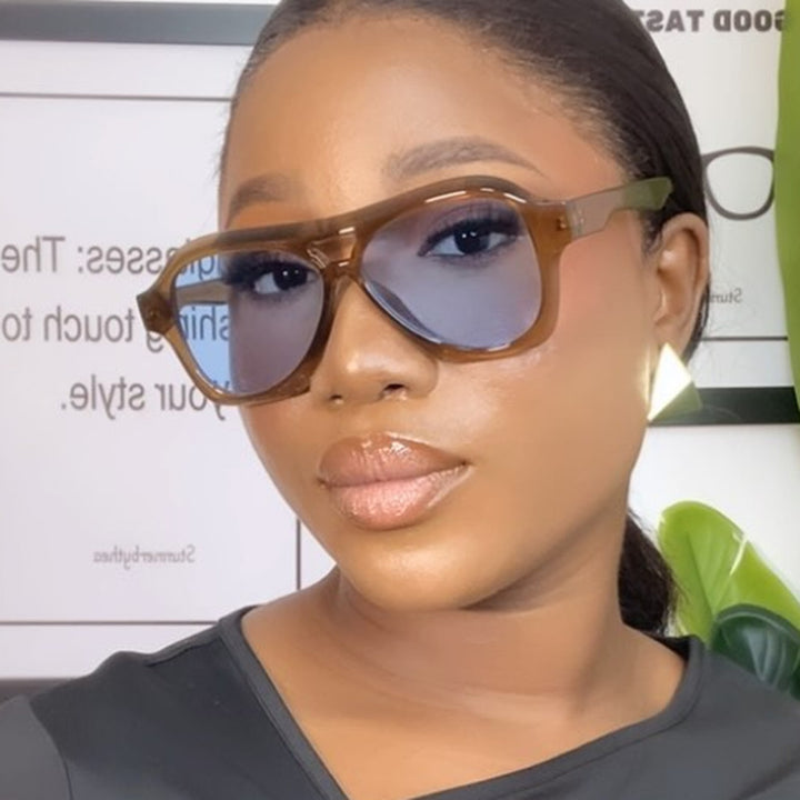 Ladies fashionable sunglasses in innovative design with wide frame Stornfield