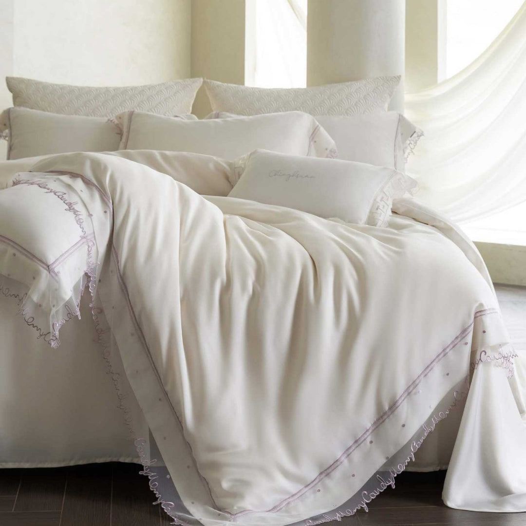 Satin bed linen set with delicate organza ruffle and lace trim