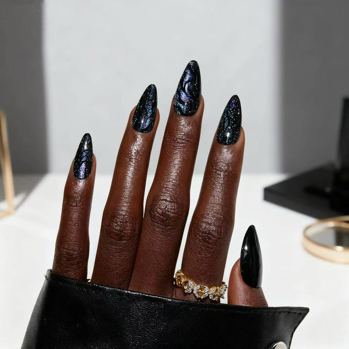 Artistic stiletto nails with shimmering effects Stornfield