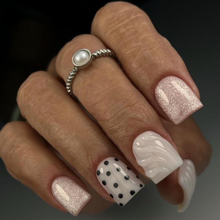 Artificial nail set with elegant glitter and dot design Stornfield