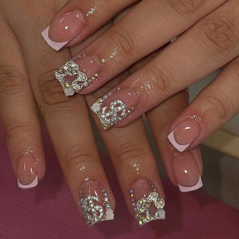 Acrylic nail set with luxurious design elements Stornfield