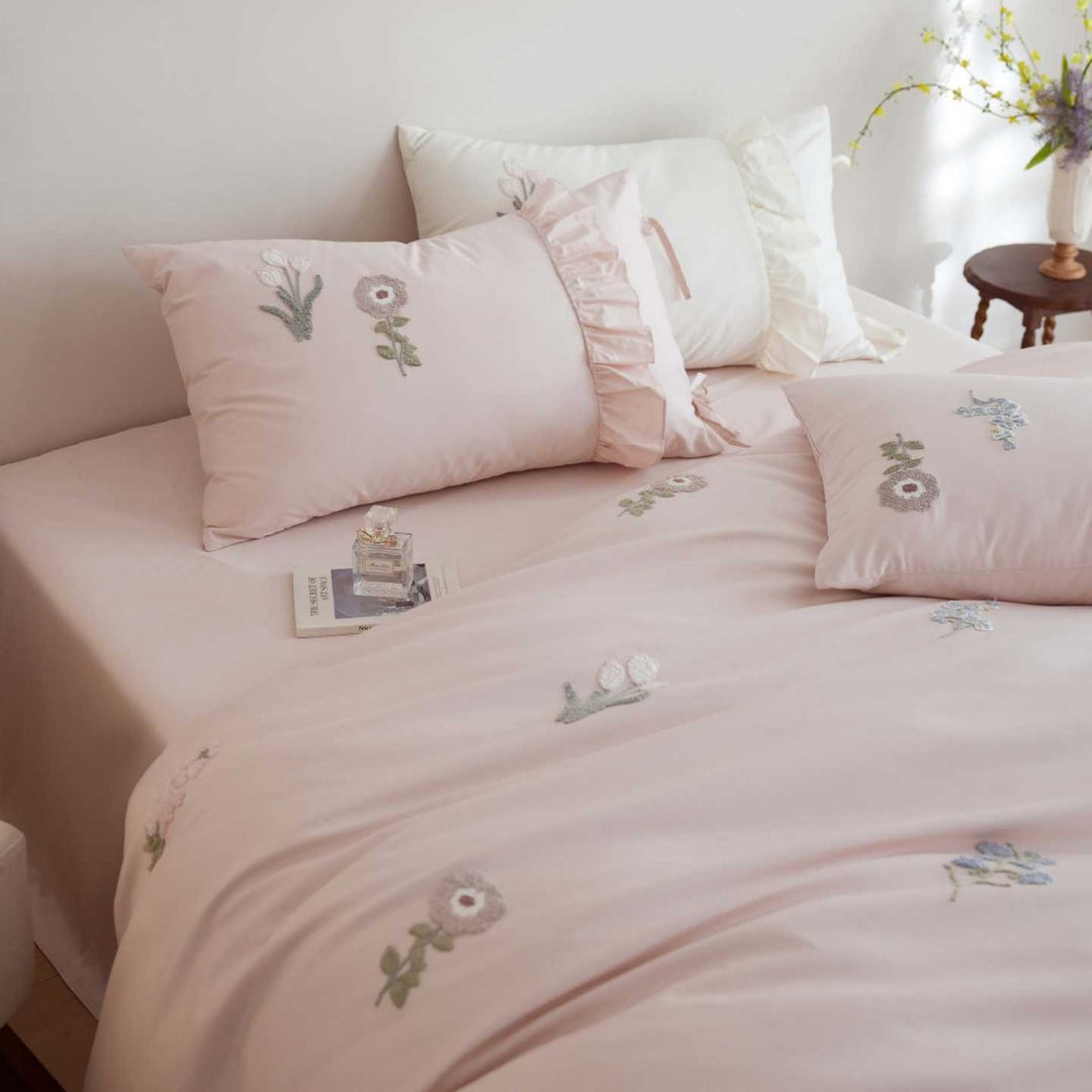 Cotton satin duvet cover set with embroidered wildflowers and decorative ruffle