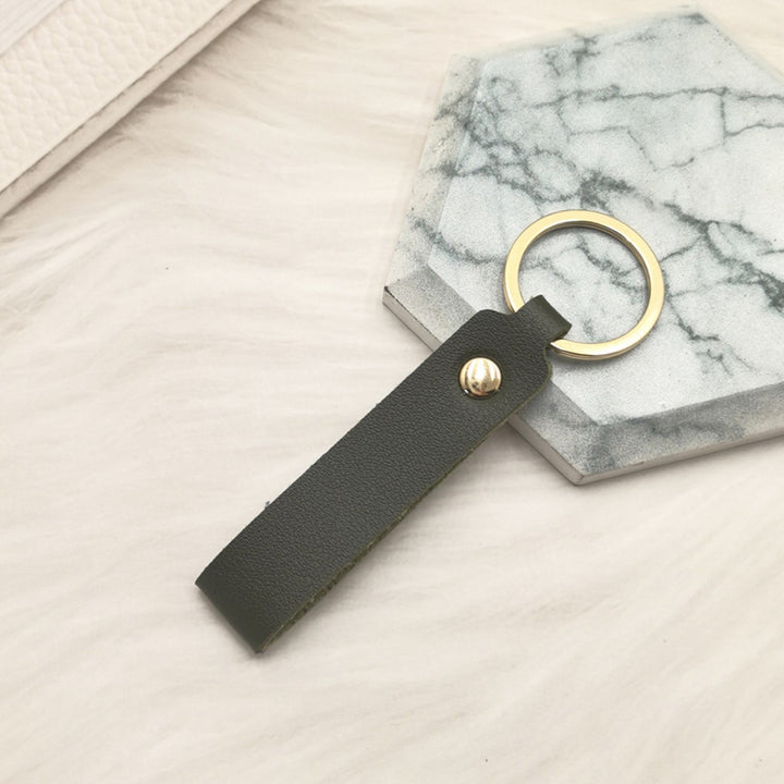 Unisex keychain made of high-quality synthetic leather with elegant metal embellishment Kalsten