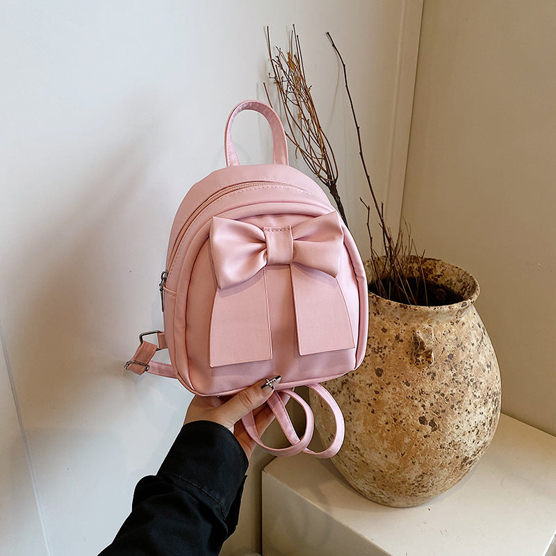 Bow-Accented Faux Leather Mini Backpack