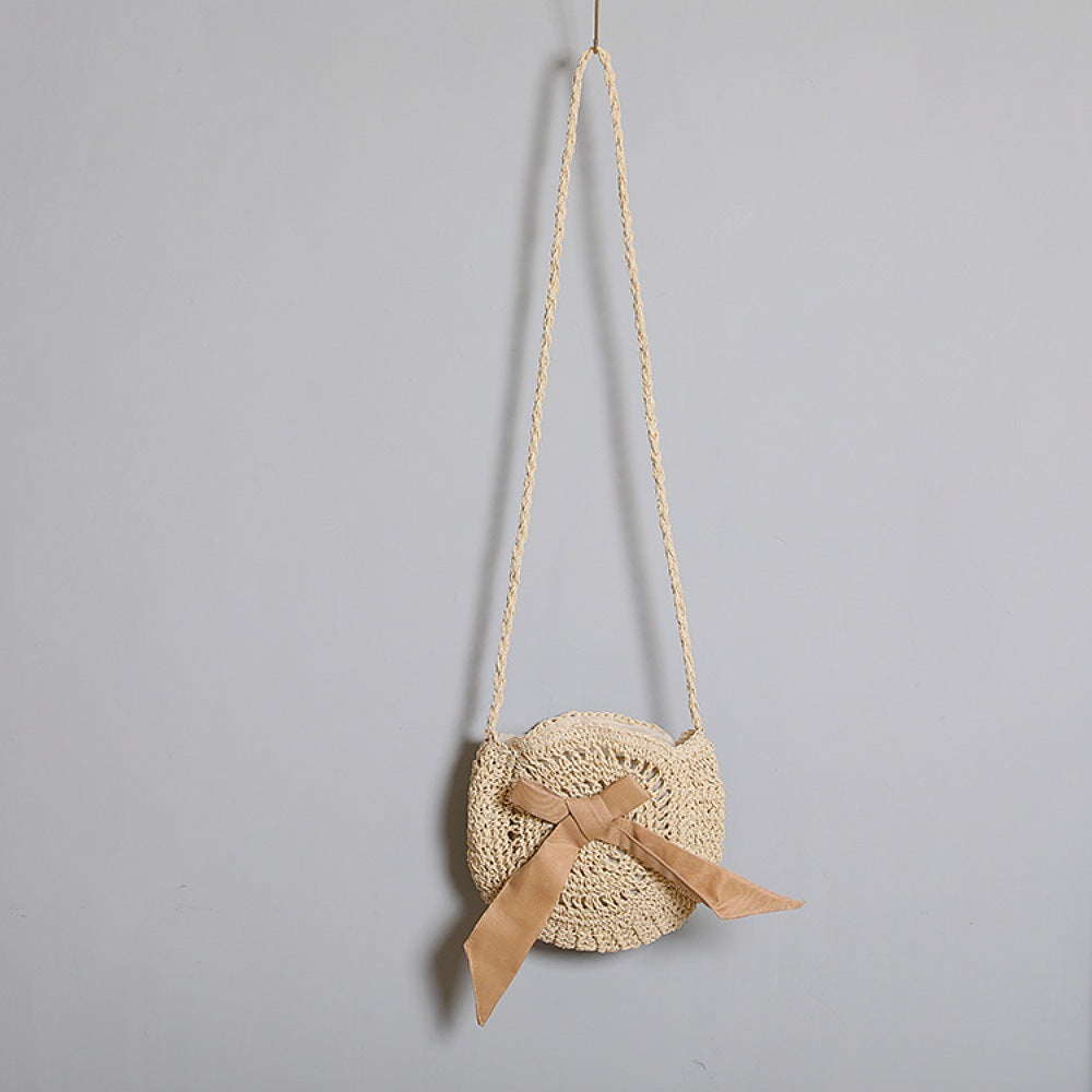 Handwoven shoulder bag with decorative bow accent Stornfield