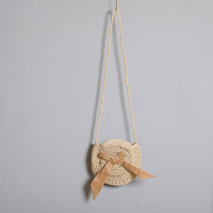 Handwoven shoulder bag with decorative bow accent Stornfield