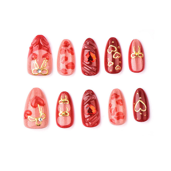 Festive artificial nails with romantic heart designs Stornfield