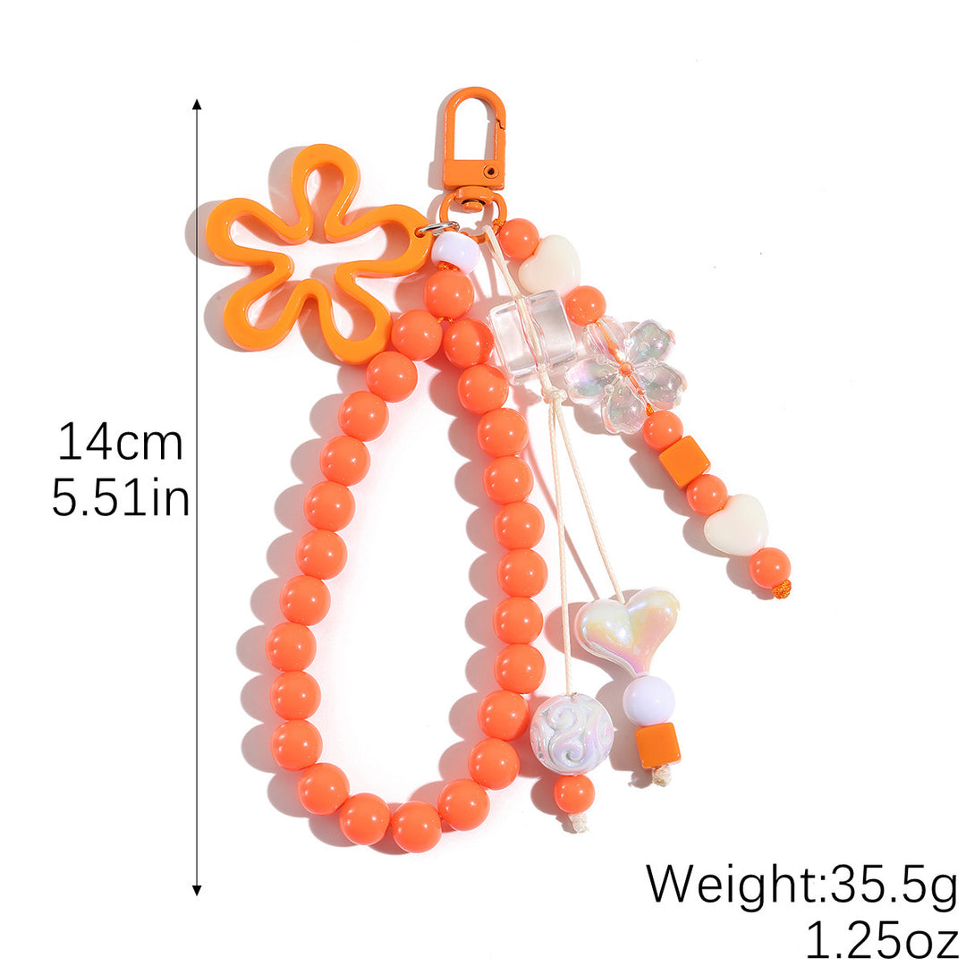 Playful keychain with flower and butterfly details Stornfield