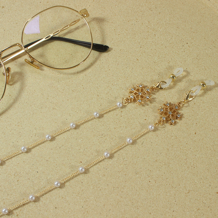 Elegant glasses holder chain with pearls and snowflake pendant Stornfield