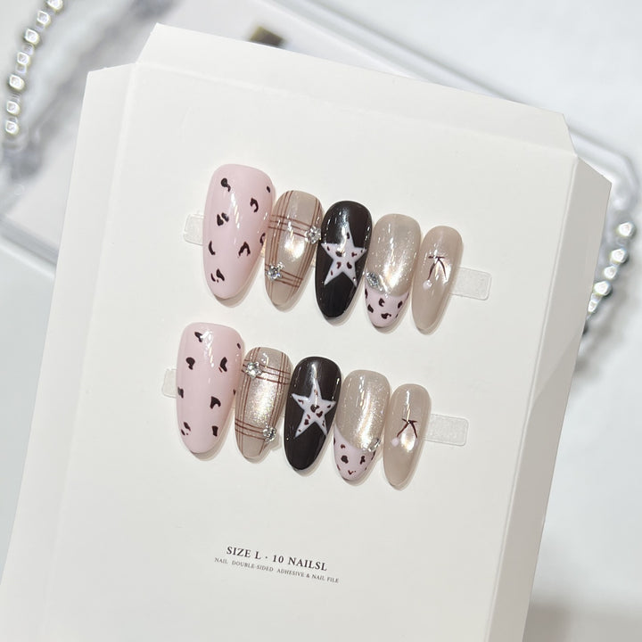 Artistic Press-On Nail Set with Star Patterns