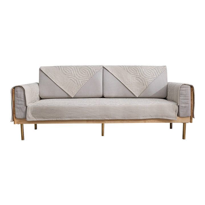 Quilted cover for sofa with armrest protectors and non-slip underside