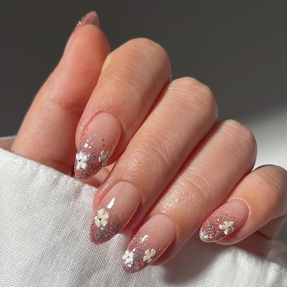 Glamorous nail extensions with glittering and floral design Stornfield
