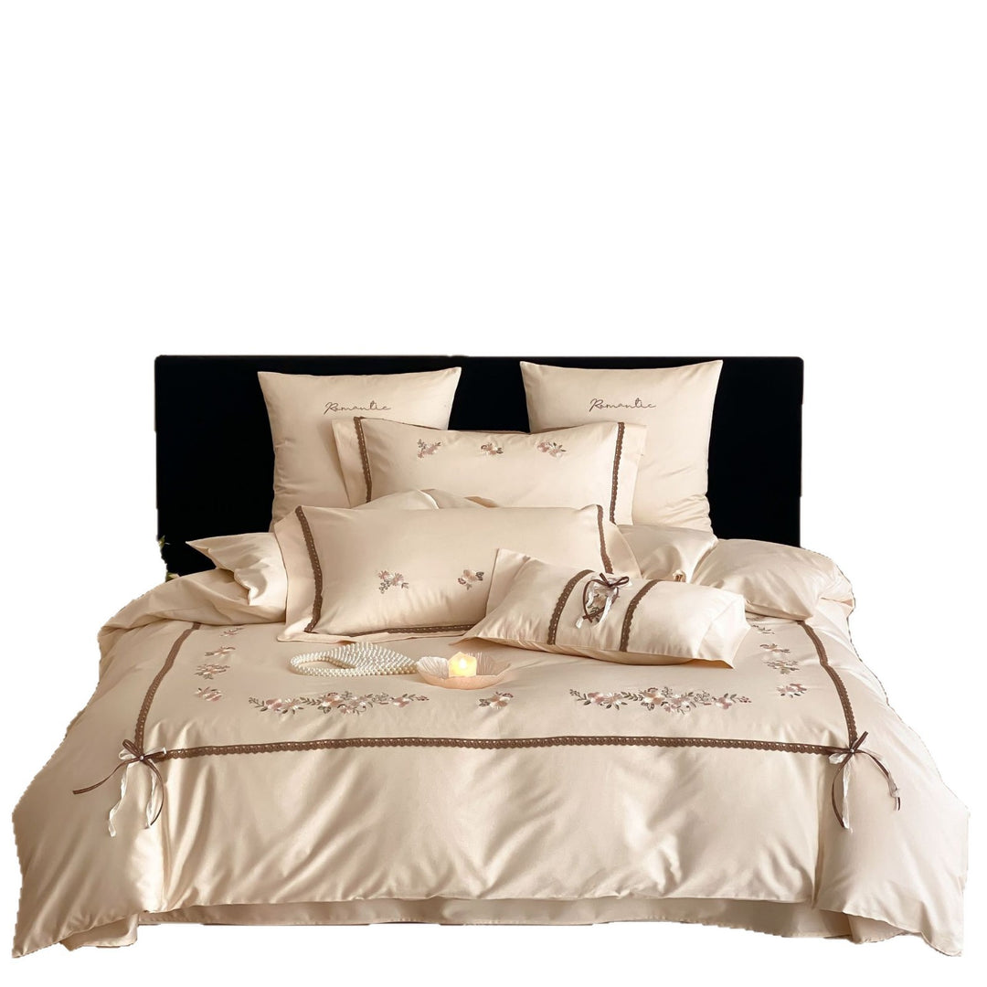 Embroidered bed linen set made of cotton satin with lace trim and floral appliqués